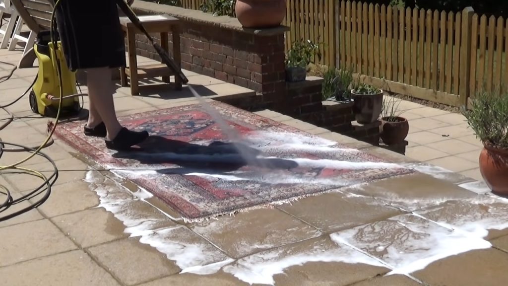 Can you clean an area rug with a pressure washer